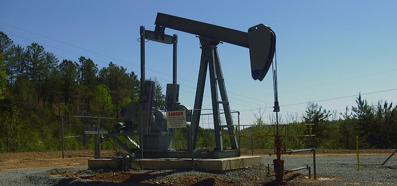 Oilfield pumpjack at a gas and oil well site